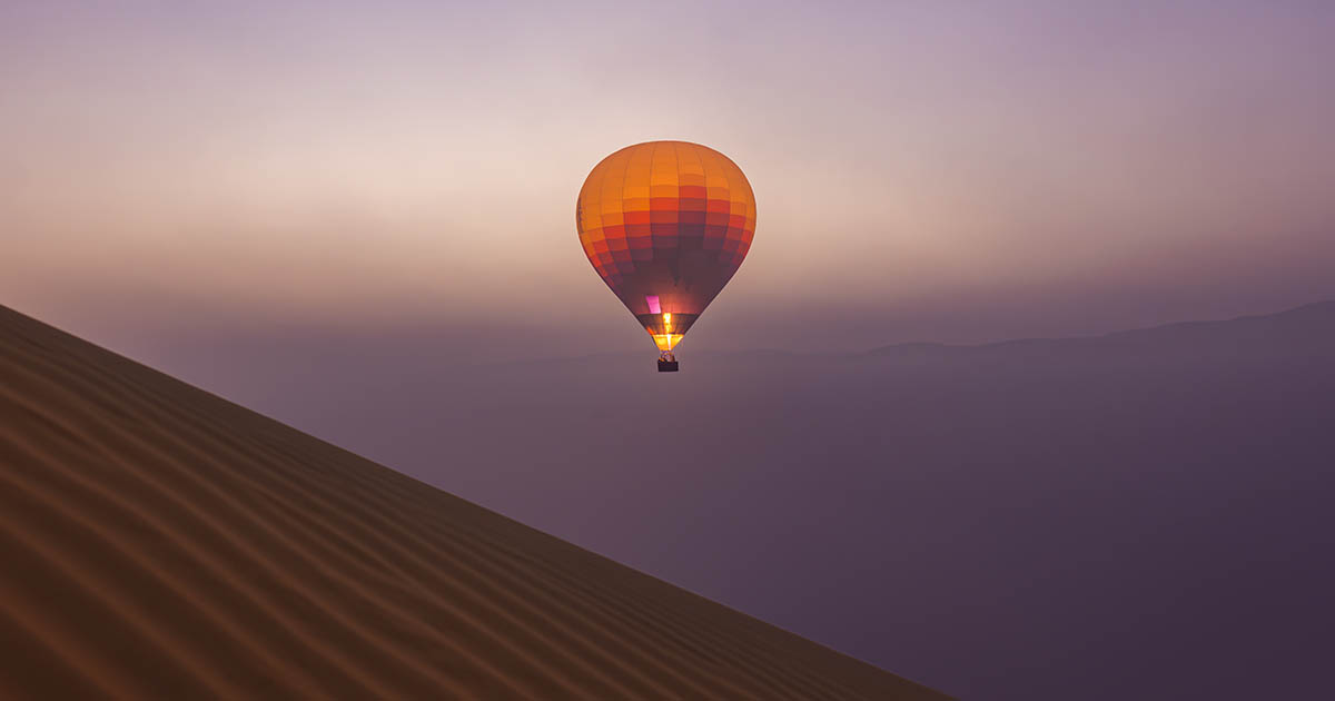 Hot air balloon over desert